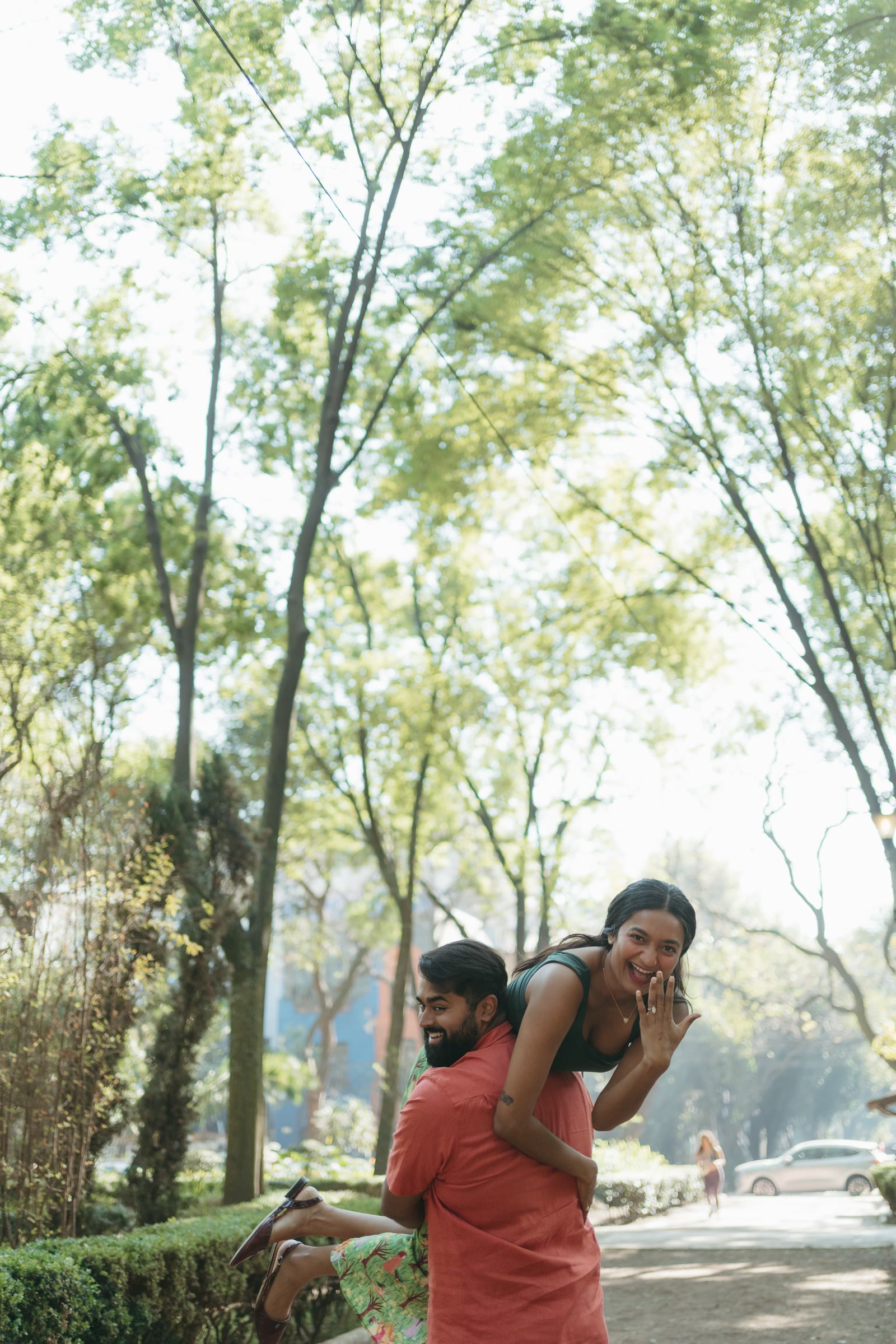Pooja on Nish’s back, both laughing
